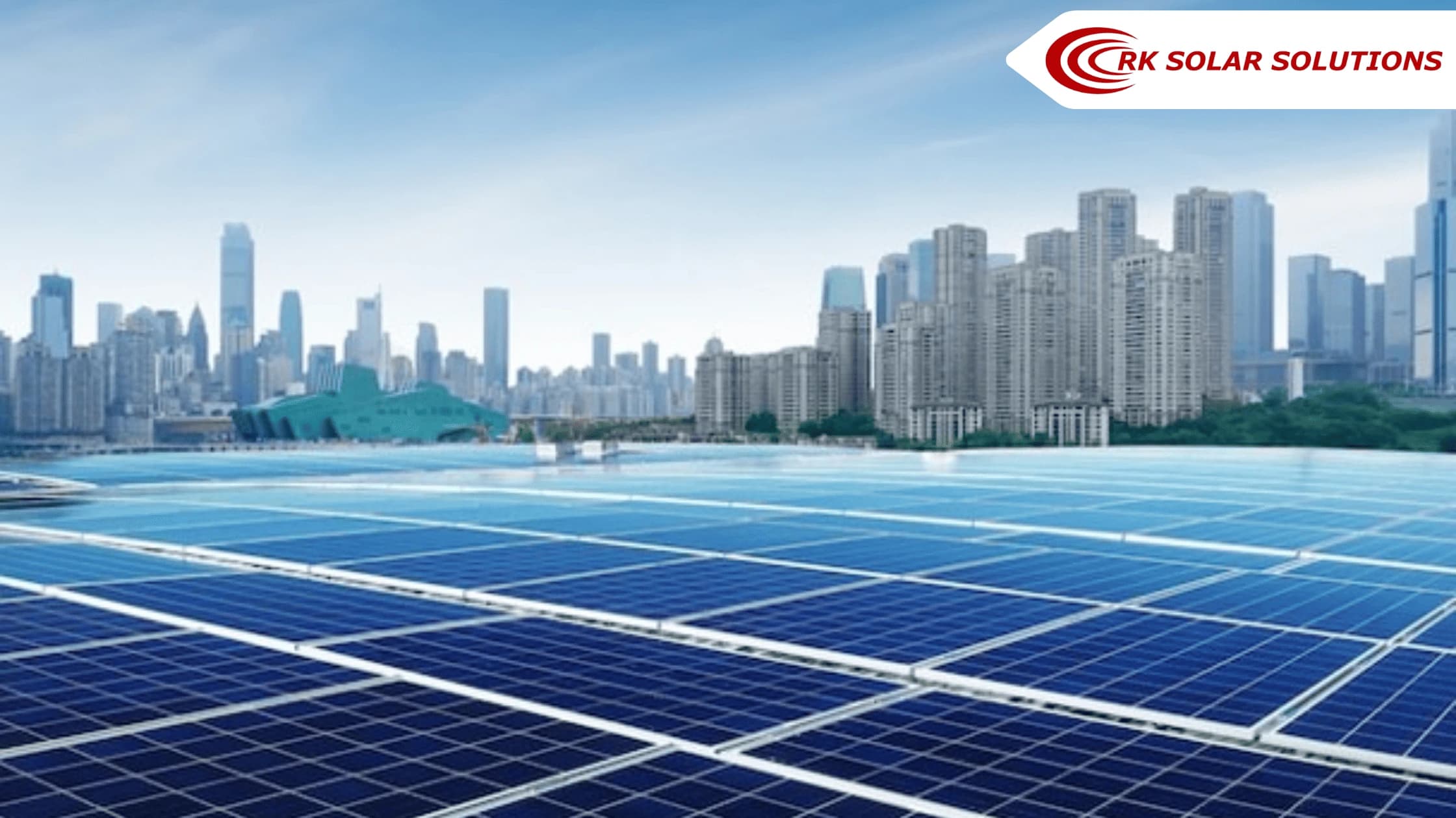 Rows of solar panels with a city skyline in the background