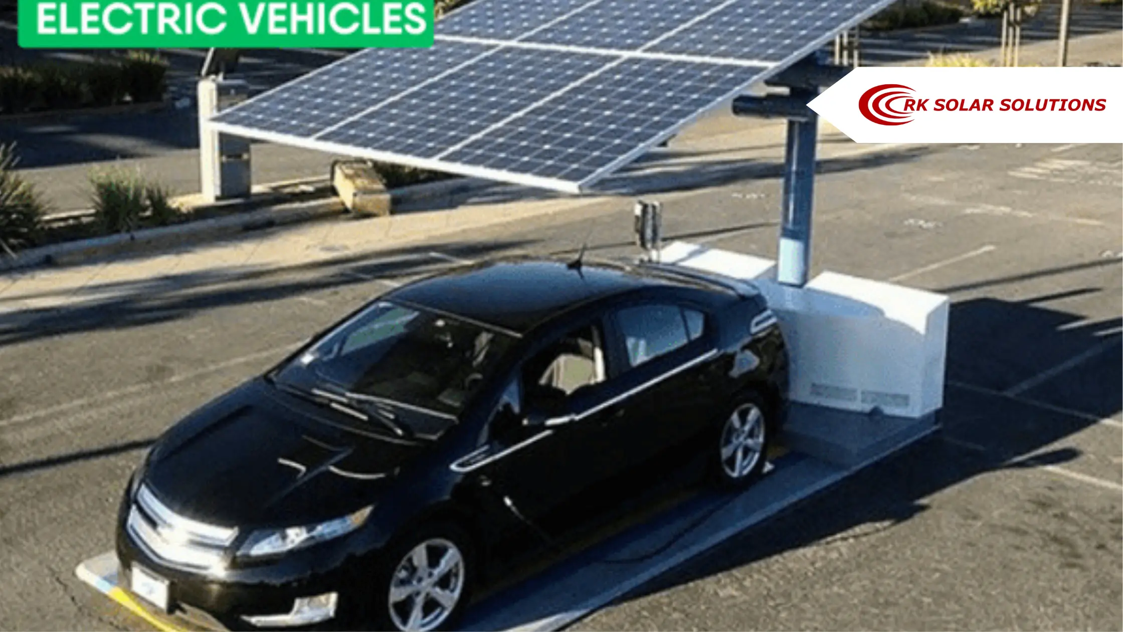 Electric car charging under a solar panel canopy