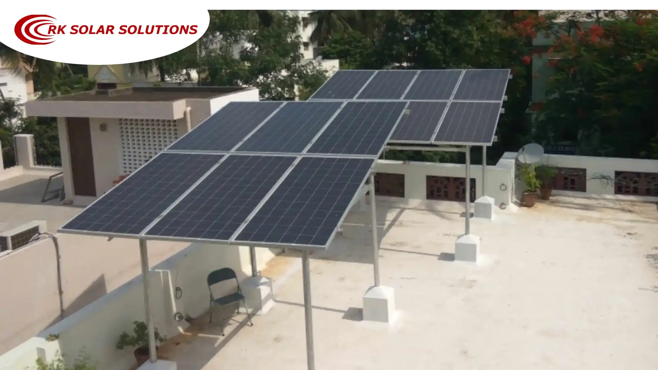 Solar panels on a raised frame on a flat house terrace
